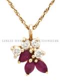 A 14 Karat Yellow Gold Ruby and Diamond Necklace