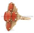 A 14 Karat Yellow Gold and Coral Ring