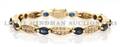 An 18 Karat Yellow Gold Sapphire and Diamond Line Bracelet