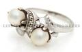 A 14 Karat White Gold and Cultured Pearl Ring