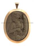 A 14 Karat Yellow Gold and Lava Stone Cameo BroochPendant