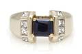 An 18 Karat White Gold Sapphire and Diamond Ring
