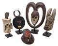 A Collection of Five African Carved and Polychrome Decorated Masks