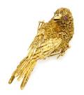 An 18 Karat Yellow Gold and Ruby Bird Brooch Piaget