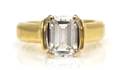 A 14 Karat Gold and Diamond Solitaire Ring