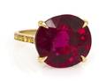 An 18 Karat Yellow Gold Rubellite and Yellow Diamond Ring