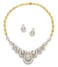 A Set of 18 Karat Gold and Diamond Jewelry