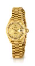 An 18 Karat Yellow Gold Datejust Wristwatch Rolex