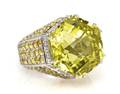 An 18 Karat White Gold Lemon Quartz Yellow Sapphire and Diamond Ring