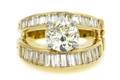 An 18 Karat Yellow Gold and Diamond Ring