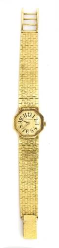 A 14 Karat Yellow Gold and Diamond Wristwatch Lucien Piccard