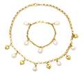 A Set of 18 Karat Yellow Gold and Cultured Pearl Jewelry