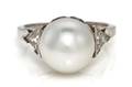 A Platinum Cultured Pearl and Diamond Ring