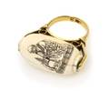 A 14 Karat Yellow Gold and Engraved Ivory Bead Ring