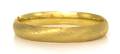 A 14 Karat Yellow Gold Textured Bangle Bracelet