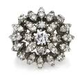 A 14 Karat White Gold and Diamond Cluster Ring