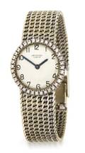An 18 Karat White Gold and Diamond Mechanical Wristwatch Universal