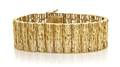 A 14 Karat Yellow Gold Textured Openwork Bracelet