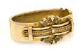 A 14 Karat Gold and Diamond Bangle Bracelet