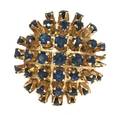 A 14 Karat Yellow Gold and Sapphire Cluster Ring