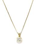 A 14 Karat Yellow Gold and Diamond Solitaire Pendant