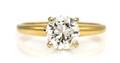 A 14 Karat Gold and Diamond Solitaire Ring