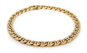 A 14 Karat Yellow Gold and Diamond Necklace