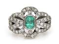 A 14 Karat White Gold Emerald and Diamond Ring