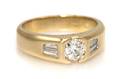 An 18 Karat Yellow Gold and Diamond Ring