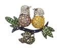 An 18 Karat Gold Fancy Color and White Diamond Tsavorite and Kyanite Bird Brooch