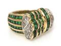 An 18 Karat Yellow Gold Emerald and Diamond Ring
