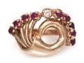 A 14 Karat Rose Gold Ruby and Diamond Spray Ring