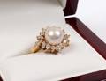 FOURTEEN KARAT YELLOW GOLD PEARL AND DIAMOND RING