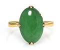 A 14 Karat Yellow Gold and Jade Ring