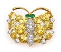 An 18 Karat Yellow Gold Platinum Yellow Sapphire Diamond and Emerald Butterfly Pin Oscar Heyman Brothers