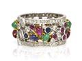 An 18 Karat Gold Ruby Sapphire Emerald and Diamond Band