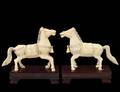 PAIR OF CARVED IVORY HORSES
