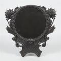 A Cast Iron Dressing Mirror