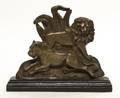 A Gilt Brass Figural Doorstop