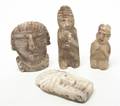 A Collection of Four PreColombian Carved Hardstone Articles