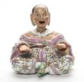 A Continental Porcelain Nodder