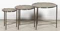 A Set of Three Silvered Metal Nesting Tables