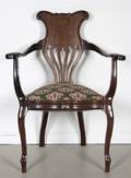 An Edwardian Inlaid Open Armchair