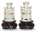 A Pair of Chinese Carved Ivory Models of an Emperor and Empress