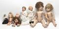 A Collection of Seven Dolls