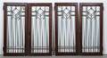 A Set of Four Leaded Glass Doors