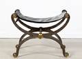 A Neoclassical Steel Brass and Leather Ottoman