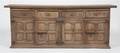 A Carved Walnut Spanish Style Cabinet