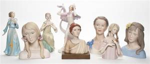 A Collection of Eight Laslo Ispanky Porcelain Articles