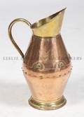 A Brass and Copper Jug
